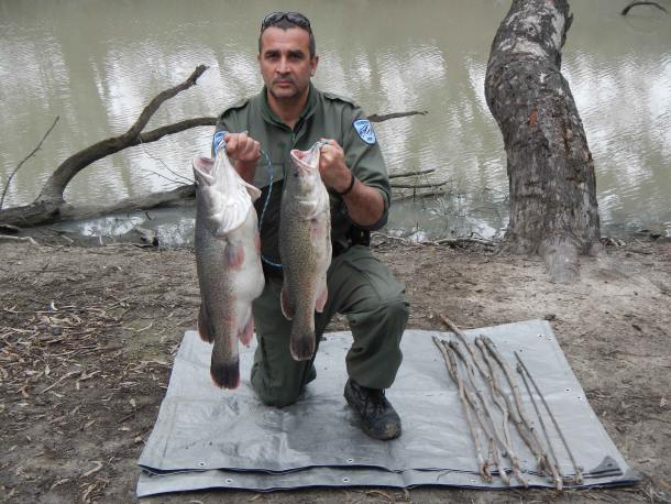 Fisho's Scott Thomas filming Bushy talking about Squidgy's new prawn lures.
